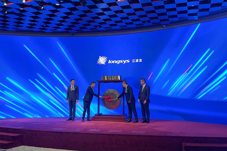 Chinese data storage company Shenzhen Longsys Electronics made a muted debut on the Hong Kong Stock Exchange on Tuesday after raising about HK$7.08 billion ($903 million) from its share sale. Longsys shares traded at HK$235.80, slightly below the HK$236 offer price, while Hong Kong’s benchmark Hang Seng Index fell 0.5 per cent and the Hang Seng TECH Index declined 1.1 per cent. The listing adds Longsys to a growing number of Chinese technology companies tapping Hong Kong’s stock market as demand for artificial intelligence infrastructure continues to drive investment in the sector. Longsys sold 29.99 million Hong Kong shares after exercising an option to increase the size of the offering. Its cornerstone investors included smartphone maker Transsion and computer manufacturer Lenovo. The Shenzhen-listed company produces memory and data storage products used in smartphones, computers, data centres, vehicles and industrial equipment. Its brands include FORESEE, Lexar and Zilia. According to the company’s listing prospectus, demand for higher-capacity and faster storage is increasing as AI data centres expand and AI features become more common in smartphones, computers and vehicles. Longsys plans to use most of the proceeds from the Hong Kong listing to increase investment in research and development, particularly in chip design and advanced memory products. The company reported a sharp increase in earnings in the first half of 2026. Net profit rose to 10.7 billion yuan ($1.59 billion), compared with 41 million yuan during the same period a year earlier. Revenue also increased 136.3 per cent year-on-year to 24.1 billion yuan. Longsys attributed the stronger performance largely to higher memory product prices, as demand exceeded supply amid increased investment in AI infrastructure and data centres. The company said selling prices increased across its major product lines, although sales volumes declined as higher raw material costs and supply shortages constrained production and led some customers to delay purchases. CITIC Securities and Citigroup acted as joint sponsors of the Hong Kong listing.